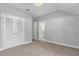 Spacious bedroom with carpet flooring and access to a full bathroom at 2234 Via Luna, Winter Park, FL 32789