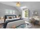 Serene bedroom with a nautical theme and built-in desk area at 2234 Via Luna, Winter Park, FL 32789