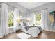 Spacious bedroom with plush bedding, large windows, and light grey walls at 2234 Via Luna, Winter Park, FL 32789