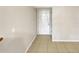 Bright and spacious entryway with tile flooring at 5545 Devonbriar Way # I101, Orlando, FL 32822
