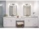 Double vanity bathroom with white cabinets and gold fixtures at 19906 Eldorado Dr, Eustis, FL 32736
