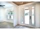 Bright and spacious entryway with hardwood floors and an abundance of natural light at 19906 Eldorado Dr, Eustis, FL 32736