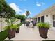 Outdoor patio with fire pit and seating area, perfect for entertaining at 342 Maple Dr, Longwood, FL 32750