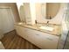 Double vanity bathroom with granite countertops and modern fixtures at 342 Maple Dr, Longwood, FL 32750