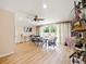 Casual dining area with sliding doors leading to the pool at 342 Maple Dr, Longwood, FL 32750