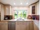 Modern kitchen with granite countertops and updated cabinets at 342 Maple Dr, Longwood, FL 32750