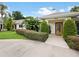 Front entrance of a single-Gathering home with landscaped walkway at 342 Maple Dr, Longwood, FL 32750