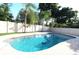 Refreshing kidney-shaped pool surrounded by a private fenced backyard at 342 Maple Dr, Longwood, FL 32750