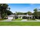 Single-Gathering home with a two-car garage and circular driveway at 342 Maple Dr, Longwood, FL 32750
