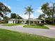 Single-Gathering home with a two-car garage and circular driveway at 342 Maple Dr, Longwood, FL 32750