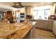 Modern kitchen with large island, stainless steel appliances, and granite countertops at 342 Maple Dr, Longwood, FL 32750
