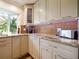 Modern kitchen with granite countertops and updated cabinets at 342 Maple Dr, Longwood, FL 32750