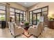 Relaxing community lounge with comfortable seating and access to outdoor patio at 1282 Zeek Ridge St, Clermont, FL 34715