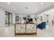 Bright living room featuring tiled floors and plenty of natural light at 1282 Zeek Ridge St, Clermont, FL 34715