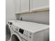Bright laundry room with washer and dryer at 1282 Zeek Ridge St, Clermont, FL 34715