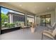Spacious screened-in porch with outdoor seating at 1282 Zeek Ridge St, Clermont, FL 34715