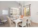 Bright dining room with table, hutch and chairs at 4036 Oakrise Loop, Davenport, FL 33837