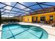 Stunning pool and spa with covered patio and plenty of seating at 4036 Oakrise Loop, Davenport, FL 33837