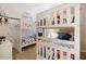 ' bedroom with bunk beds, Mickey Mouse decor, and ample floor space at 4036 Oakrise Loop, Davenport, FL 33837