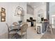 Bright kitchen with breakfast nook, stainless steel appliances, and ample counter space at 4036 Oakrise Loop, Davenport, FL 33837