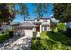 Two-story house with a two-car garage and manicured lawn at 1134 Harbor Hill St, Winter Garden, FL 34787