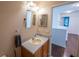 Clean bathroom with updated vanity and mirror at 1134 Harbor Hill St, Winter Garden, FL 34787