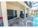Relaxing patio with seating and pool access at 1134 Harbor Hill St, Winter Garden, FL 34787