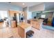 Spacious kitchen boasts stainless steel appliances and granite countertops at 1134 Harbor Hill St, Winter Garden, FL 34787
