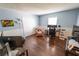 Home office with hardwood floors, built-in desk, and ample space at 1134 Harbor Hill St, Winter Garden, FL 34787
