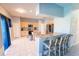 Kitchen features granite countertops, stainless steel appliances, and breakfast bar at 1134 Harbor Hill St, Winter Garden, FL 34787
