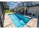 Inviting screened pool with paver deck at 1134 Harbor Hill St, Winter Garden, FL 34787