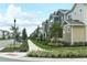 Row of townhouses with sidewalks and landscaping at 6940 Twilight Bay Dr, Winter Garden, FL 34787