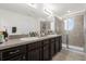 Double vanity bathroom with a large shower at 3387 Beaute Dr, Kissimmee, FL 34746