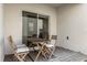 Small patio with table and chairs at 3387 Beaute Dr, Kissimmee, FL 34746