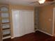 Bedroom featuring double closet and built-in shelving at 200 Afton Sq # 102, Altamonte Springs, FL 32714