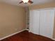 Bedroom with wood floors, built-in shelving, and double closet at 200 Afton Sq # 102, Altamonte Springs, FL 32714