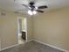 Bedroom with carpet, ceiling fan and en-suite bathroom at 200 Afton Sq # 102, Altamonte Springs, FL 32714