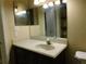Primary bathroom with double sink vanity and large mirror at 200 Afton Sq # 102, Altamonte Springs, FL 32714