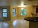 Bright dining area with tile floors and large windows at 200 Afton Sq # 102, Altamonte Springs, FL 32714