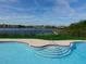 Community pool with lake view at 200 Afton Sq # 102, Altamonte Springs, FL 32714