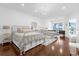 Main bedroom with water views and hardwood floors at 8629 Saint Marino Blvd, Orlando, FL 32836