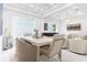 Bright dining room with a large table and modern light fixtures at 8629 Saint Marino Blvd, Orlando, FL 32836