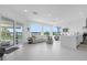 Spacious living room with water views and modern furniture at 8629 Saint Marino Blvd, Orlando, FL 32836