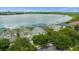 Luxury homes located on a lake with city views in the background at 8629 Saint Marino Blvd, Orlando, FL 32836