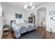 Bright and airy main bedroom with ensuite bathroom access at 8629 Saint Marino Blvd, Orlando, FL 32836