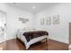 Spacious bedroom with hardwood floors and neutral decor at 8629 Saint Marino Blvd, Orlando, FL 32836