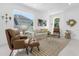 Bright living room with comfy seating and large window offering natural light at 8629 Saint Marino Blvd, Orlando, FL 32836