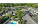 Aerial view of community showing homes, landscape, and pool at 122 Crown Point Cir, Longwood, FL 32779