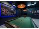 Game room with pool table and bar-themed decor at 171 Burma St, Kissimmee, FL 34747