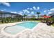 Inviting pool and spa area with lounge chairs and patio furniture at 171 Burma St, Kissimmee, FL 34747